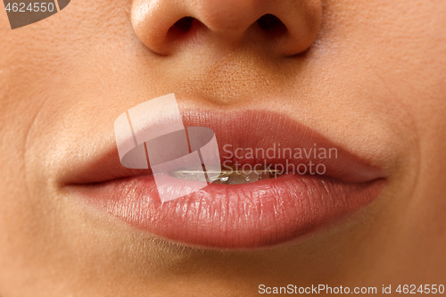 Image of Beautiful woman face lips nose closeup beauty skin care concept