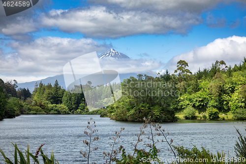 Image of volcano Taranaki covered in clouds, New Zealand 