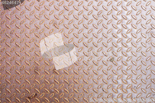 Image of rusty diamond metal plate background