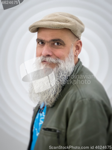 Image of bearded man with leather jacket and hat