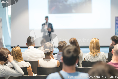 Image of Male business speaker giving a talk at business conference event.