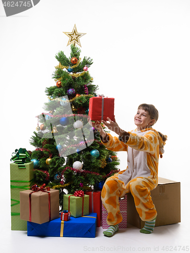 Image of Girl holding a treasured New Year present