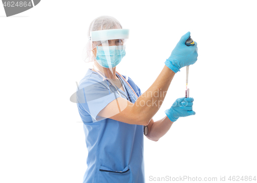 Image of Hospital worker pipetting blood from a tube for analysis