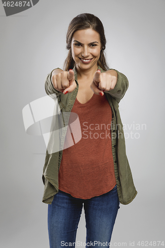 Image of Beautiful woman pointing 