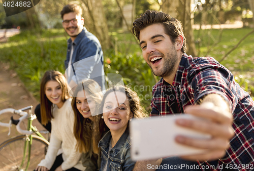 Image of Friends in the park making a selfie