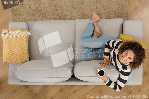 Image of Beautiful woman at home