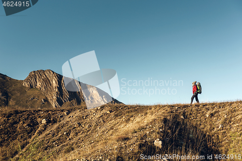 Image of Woman exploring the montains