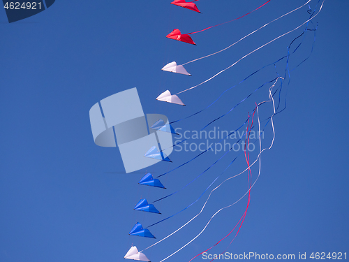 Image of Red, white and blue kites