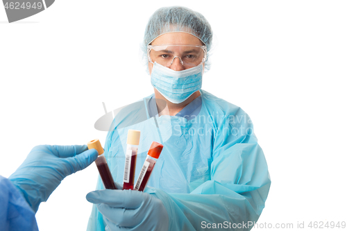 Image of Nurse or doctor holding some patient pathology blood samples  