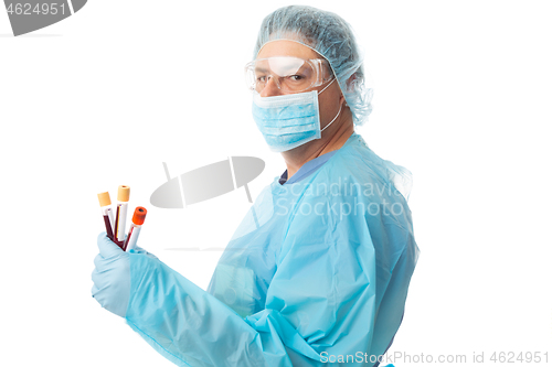 Image of Doctor or nurse wearing full PPE and holding blood test tubes