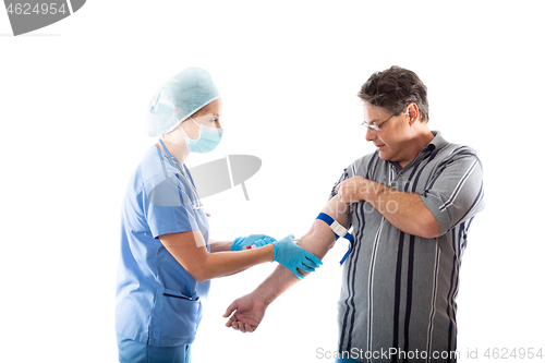 Image of A patient has blood drawn for pathology testing and diagnosis