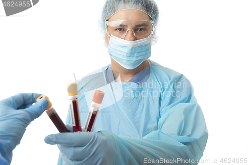 Image of Pathologists with blood samples for testing