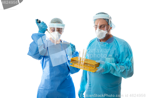 Image of Laboratory workers testing  swabs