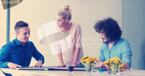 Image of Startup Business Team At A Meeting at modern office building