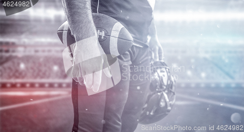 Image of closeup American Football Player isolated on big modern stadium