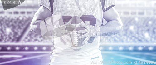 Image of closeup American Football Player isolated on big modern stadium