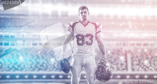 Image of American Football Player isolated on big modern stadium field