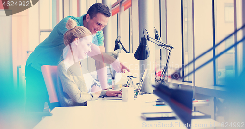 Image of Business People Working With laptop in office