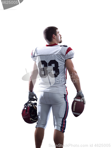 Image of Portrait of American football player pointing against white back