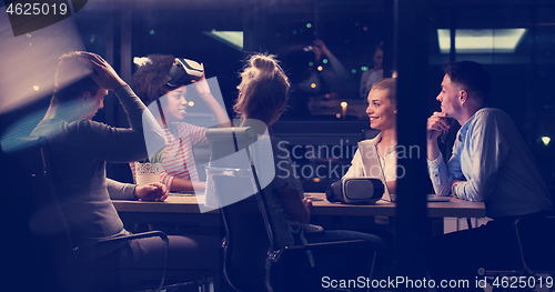 Image of Multiethnic Business team using virtual reality headset