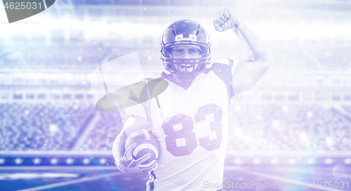 Image of american football player celebrating touchdown