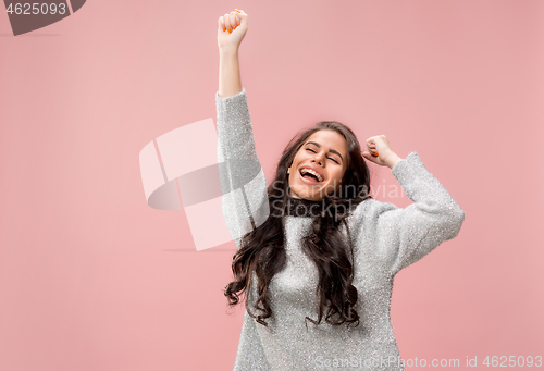 Image of Winning success woman happy ecstatic celebrating being a winner. Dynamic energetic image of female model