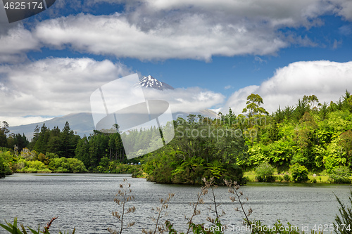 Image of volcano Taranaki covered in clouds, New Zealand 