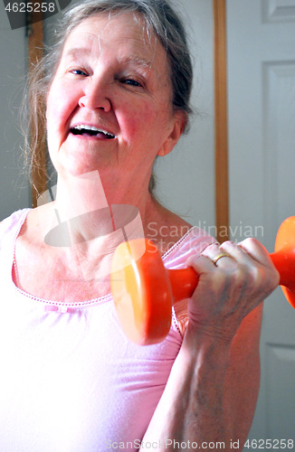 Image of Female working out.