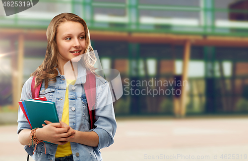 Image of happy smiling teenage student girl with school bag