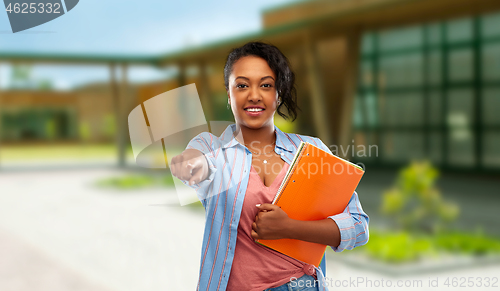 Image of african american student woman with notebooks