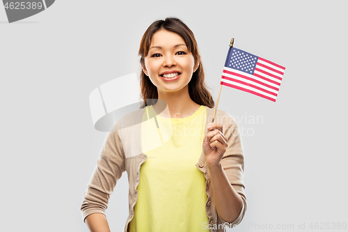 Image of happy asian woman with american flag