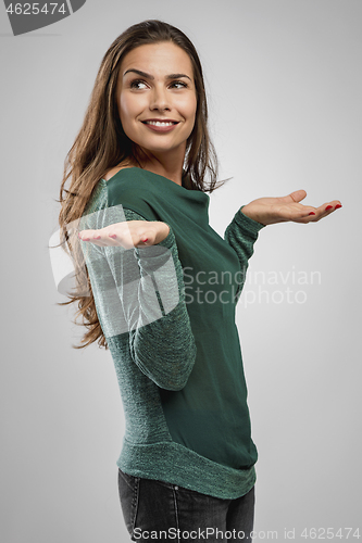 Image of Beautiful woman with arms open