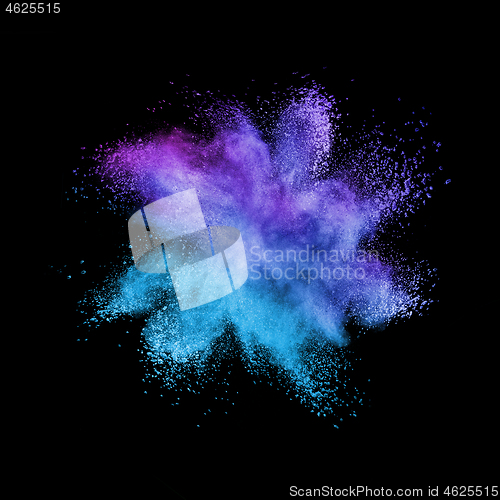 Image of Abstract multicolored powder splash on a black background.
