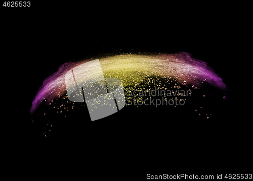 Image of Curved colorful wave from powder splash on a black background.