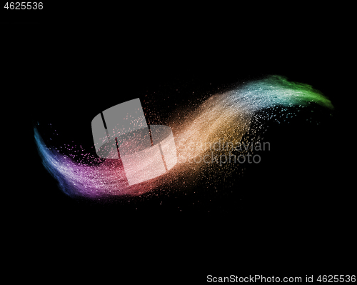 Image of Rainbow powder wave splash on a black background.