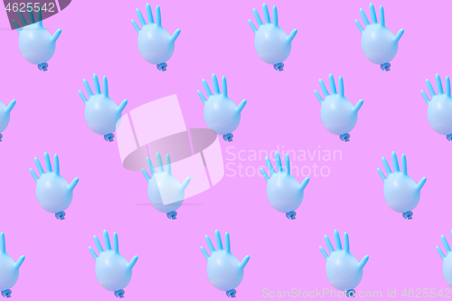 Image of Pattern from blue latex glove as balloons on hot pink background.