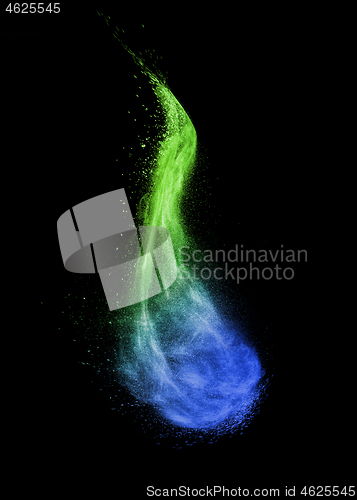 Image of Vertical wave as a colorful powder explosion on a black background.