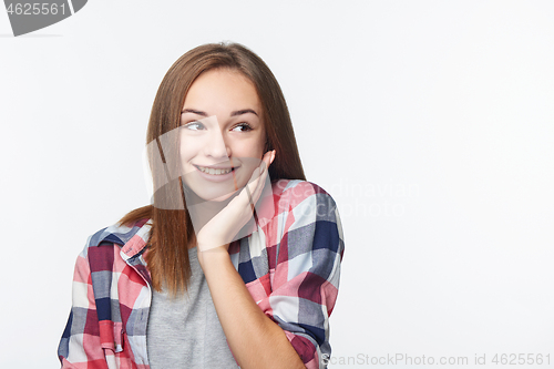 Image of Surprised teen girl looking to the side