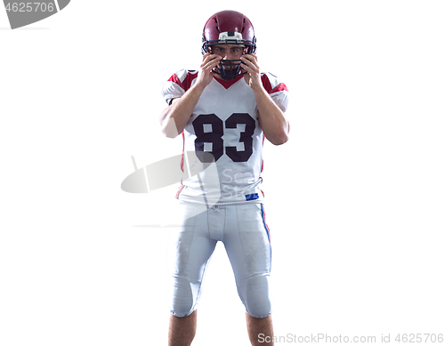 Image of Portrait of American football player pointing against white back