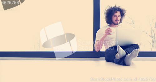 Image of man enjoying relaxing lifestyle