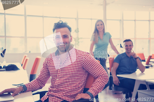 Image of Portrait of young informal businessman