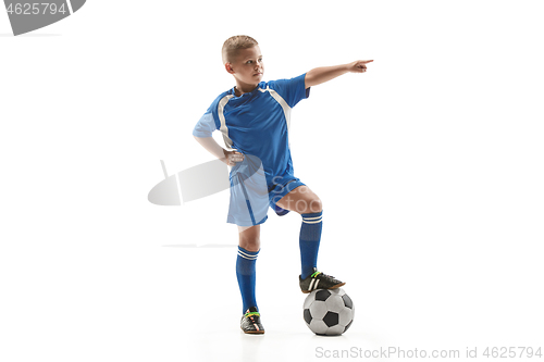 Image of Young fit boy with soccer ball standing isolated on white