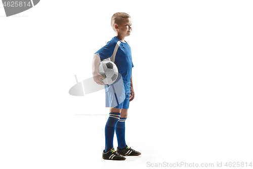 Image of Young fit boy with soccer ball standing isolated on white