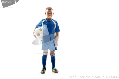 Image of Young fit boy with soccer ball standing isolated on white