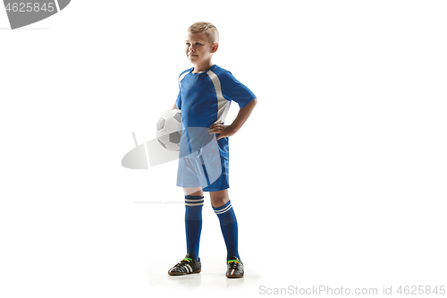 Image of Young fit boy with soccer ball standing isolated on white