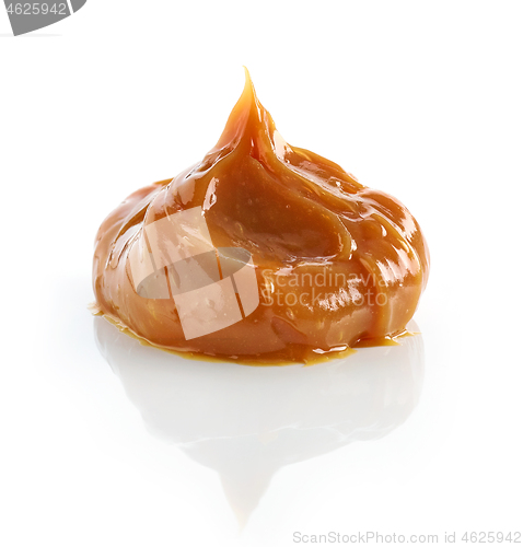 Image of soft caramel on white background