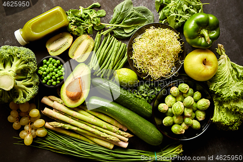 Image of Green healthy food composition with avocado, broccoli, apple, smoothie...