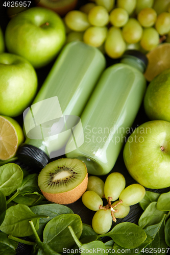 Image of Fresh fruits and vegetables in green color concept