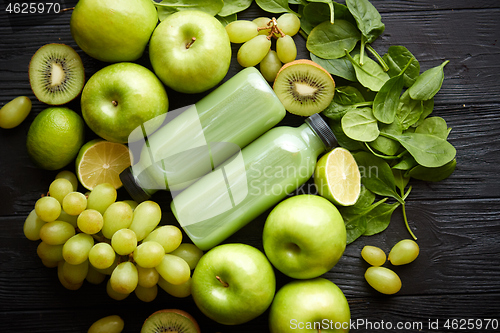 Image of Fresh fruits and vegetables in green color concept