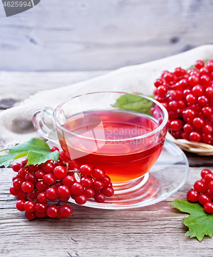 Image of Tea from viburnum in cup on gray board